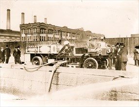 New York Fire Engine Pumper being filled from river water 1911