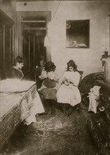 Italian Family manufactures scarf's, slippers and muffs in their tenement apartment 1911