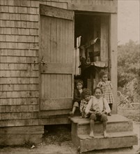 Four children - about 3 to 6 years old. Home all alone and settlement deserted. 1911