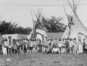 Large Native American Group In front of Teepees 1923