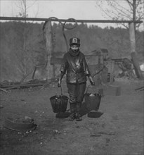 Boy with crushed leg works in the mines. 1906