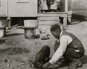 George Cox, 13 year old colored boy, has just joined the 4 H Club and is raising a pig.  1921