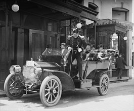 German Military attaché alights from his coupe with others of the German Delegation in DC 1912