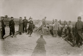 German prisoners burying dead