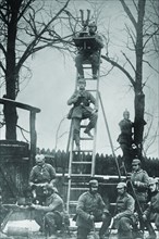 German Unit of Field Observers on ladders and with binoculars 1917