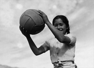 Girl and volley ball  1943