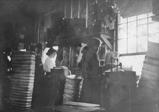 Girls making meat baskets 1908
