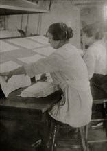 Girls working at mangle in Bonanno Laundry,  1917