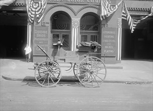 Grant Carriage in front of the Dodge Brothers Passenger and Business Cars.