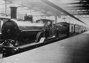 Great Britain Steam Locomotive and train at Station 1912