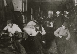 Group of sweatshop workers in shop of M. Silverman. 30 Suffolk St. 1908