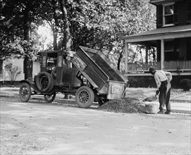 Heating Coal Being shoveled from a Ford Dump Truck 1925