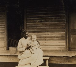 Higginbotham baby stays at home with Black nurse.  1911