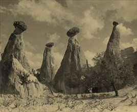 Hoodoo Rock Formations Look like Stone men with Heads in Cappodocia, Turkey 1920