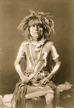 Honovi-Walpi snake priest, with Totkya Day painting 1900