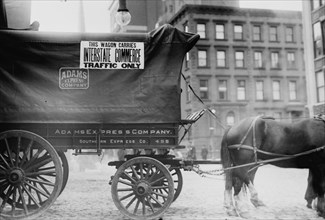 Horse & Wagon with sign saying that it is being used in Interstate Commerce Only