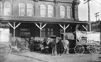 Horse-drawn wagons in front of the Center Market, Washington, D.C. 1890