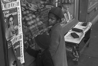 Peering into a Window of Fruits & Groceries 1937