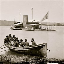 James River, Va. Monitor U.S.S. Onondaga; soldiers in rowboat in foreground 1864