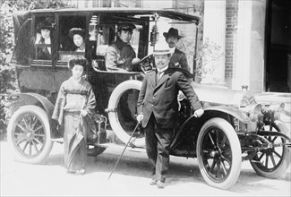 Japanese Family poses with the vehicle in Beijing, China