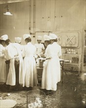 Japanese nurses and doctor during surgery 1905