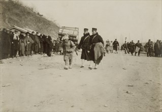 Korean coolie carrying medical supplies 1904