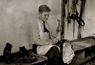 Learning to make shoes. Training School for Deaf Mutes 1917