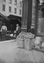 Lena Lochiavo, 11 years old, 209 W. Sixth St., Basket Seller, Sixth Street Market,  1908