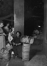 Lena Lochiavo, 11 years old, Basket Seller, Sixth St. Market,  1908