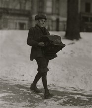 Delivering a heavy typewriter about half a mile. 1917