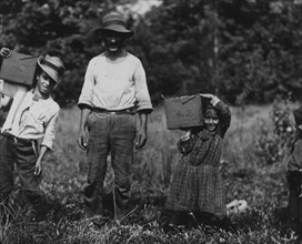 Lucy ---- carrying peck of cranberries (weighing about 15 pounds) long distance to "bushel man."  1910