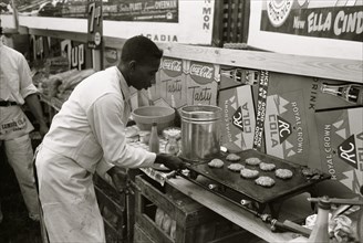 Making hamburgers in concession stand, National Rice Festival, Crowley, Louisiana 1938