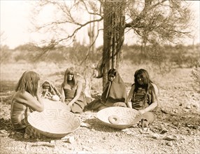 Maricopa women and a child seated on ground  1907