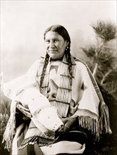 Mother Mary Martin holding cradleboard 1900