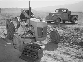 Tractor repair: Driver Benji Iguchi, Mechanic Henry Hanawa,  1943