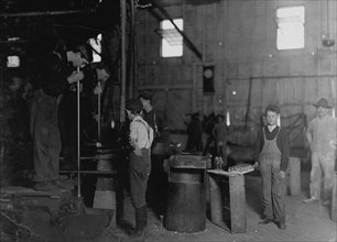 Men with Foot Mold and Boys. A West Virginia Glass Works 1908