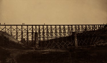 Military railroad bridge over Potomac Creek on the Richmond, Fredericksburg & Potomac Railroad, built by the U.S.M.R.R. Construction Corps, C.F. Nagle, supervisor / photographed by Capt. A.J. Russell,...