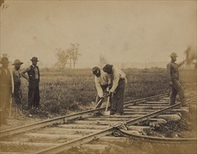 Military railroad operations in northern Virginia: African American laborers working on rail 1863