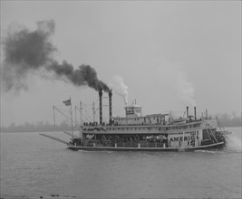 Mississippi River Boat, The "American" Paddle Wheels her way along the River 1906