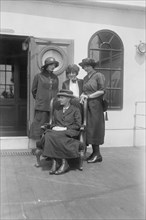 Mme Curie & daughters. And Mrs. meloney nown