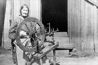 Mountain Women at a Spinning Wheel 1913