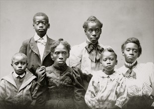 Mrs. Frazer Baker and children, family of the murdered postmaster 1899