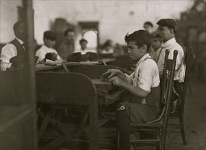 One of the smallest apprentices I found. (Work being slack.) De Pedro Casellas Cigar Factory, Tampa, FL 1909
