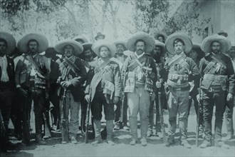 Pancho Villa and His bandits with bandoliers and guns 1919