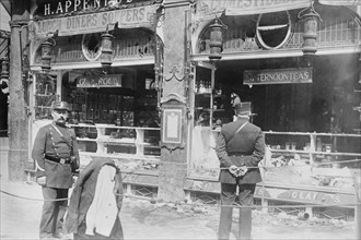 Parisian Police Look at German Shops Ransacked by Mob 1918