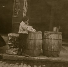 Patching Up a Meal from a Barrel Boston Slums 1910
