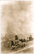 People sit on hill overlooking the Fires after the earthquake 1906