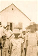 People standing in front of a building, Old Bight, Cat Island, Bahamas 1935