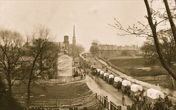 The first Federal wagon train entering the town 1863