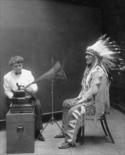 Piegan Indian, Mountain Chief, having his voice recorded 1916